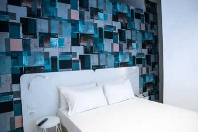 Letto o letti in una camera di Soul Art Hotel