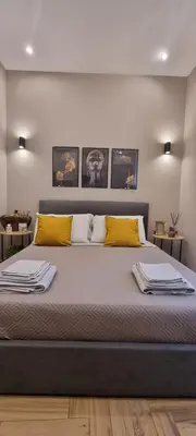 Letto o letti in una camera di Masaniello Apartment