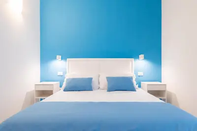 Letto o letti in una camera di Napoliving