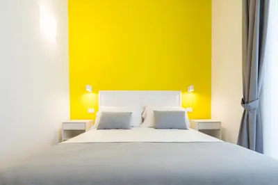 Letto o letti in una camera di Napoliving