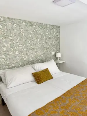 Letto o letti in una camera di Residenza San Biagio