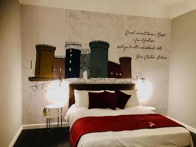 Letto o letti in una camera di Galleria Sanfelice