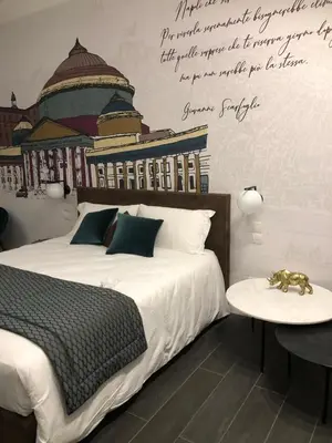 Letto o letti in una camera di Galleria Sanfelice