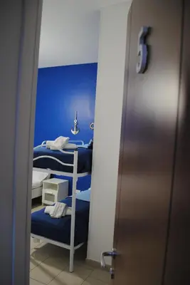 Letto o letti in una camera di Molo 5