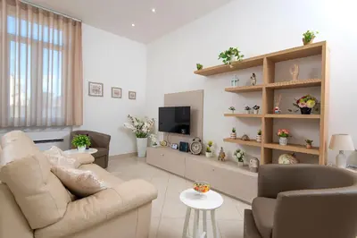 TV o dispositivi per l'intrattenimento presso La Preziosa Apartment Duomo