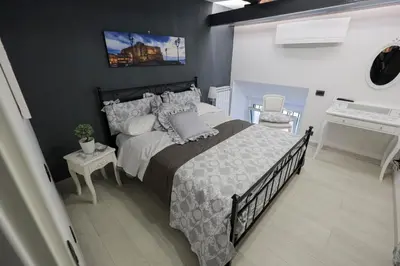 Letto o letti in una camera di HAPPY HOUSE 31