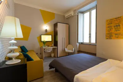 Letto o letti in una camera di H Rooms boutique Hotel