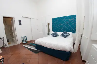 Letto o letti in una camera di La Sirena a Mergellina