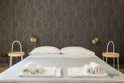 Letto o letti in una camera di Vesevo Rooms
