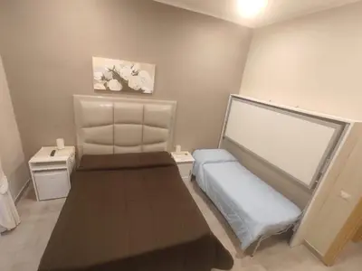 Letto o letti in una camera di Sunrise 15