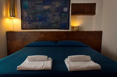 Letto o letti in una camera di Dimora dei Giganti Apartment