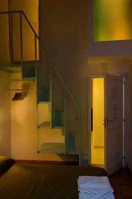Letto o letti in una camera di Dimora dei Giganti Apartment