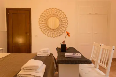 Letto o letti in una camera di Sui Tetti Di Napoli Apartment