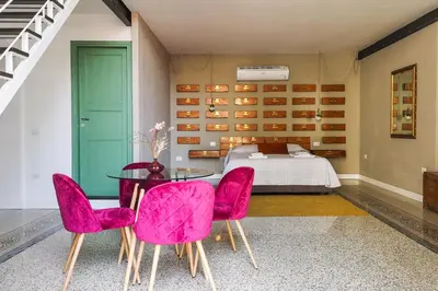 Letto o letti in una camera di Palà Suites