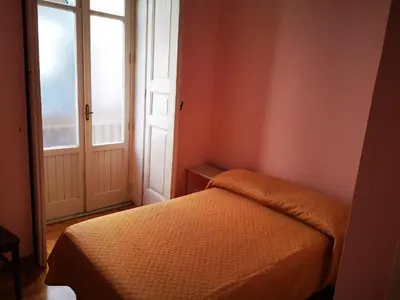Letto o letti in una camera di Casa Cupiello Via Chiaia - Casa Vacanze ad uso Esclusivo