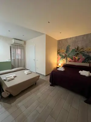 Letto o letti in una camera di Mare chiaja