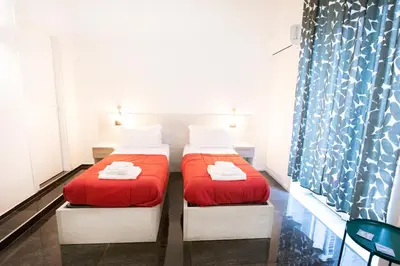 Letto o letti in una camera di Hall inn B&B in Chiostro