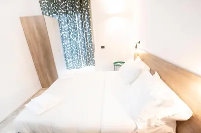 Letto o letti in una camera di Hall inn B&B in Chiostro