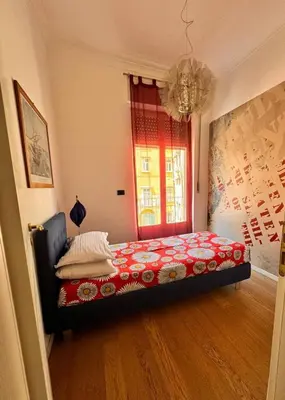 Letto o letti in una camera di Quartino 109