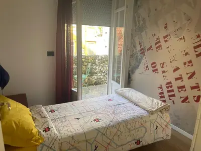 Letto o letti in una camera di Quartino 109