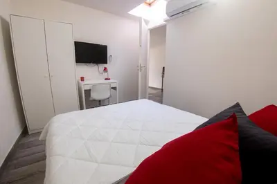 Letto o letti in una camera di Donna Carmen Casa Vacanze