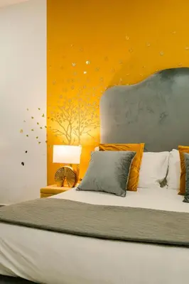 Letto o letti in una camera di Random B&B By Dimorra
