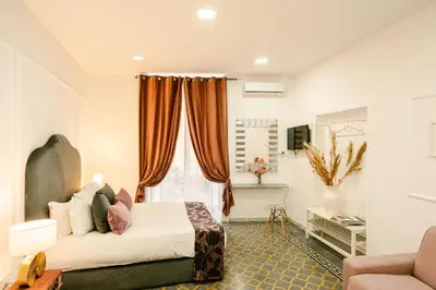 Letto o letti in una camera di Random B&B By Dimorra