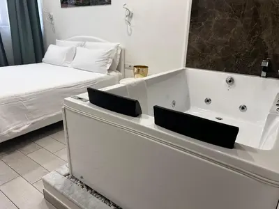 Letto o letti in una camera di MERGELLINA AMORE e FANTASIA