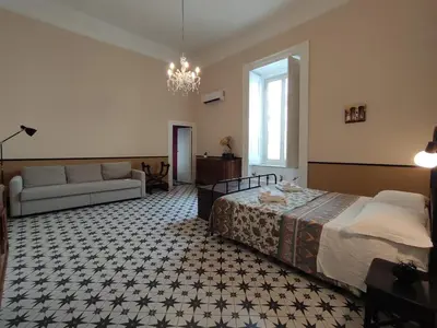 Letto o letti in una camera di suite fontanelle