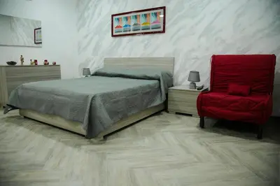 Letto o letti in una camera di Home Maria