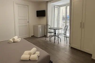 Area soggiorno di NAPOLI VIBES Rooms