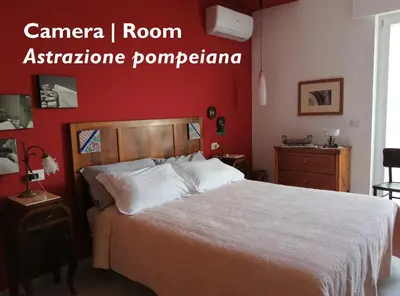 Letto o letti in una camera di B&B ICHOME NAPOLI - Maison d'Artiste
