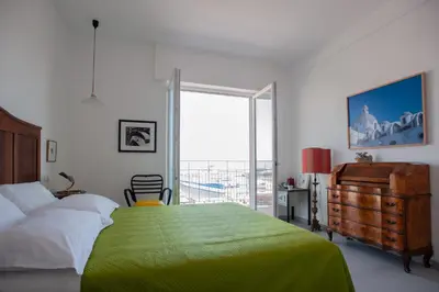 Letto o letti in una camera di B&B ICHOME NAPOLI - Maison d'Artiste