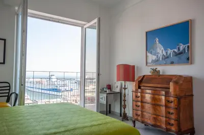 Letto o letti in una camera di B&B ICHOME NAPOLI - Maison d'Artiste