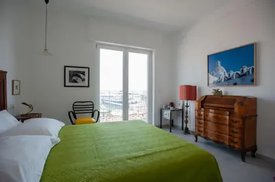 Letto o letti in una camera di B&B ICHOME NAPOLI - Maison d'Artiste