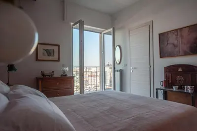 Letto o letti in una camera di B&B ICHOME NAPOLI - Maison d'Artiste