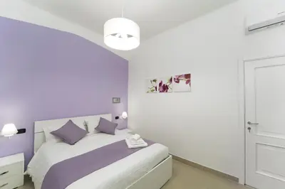 Letto o letti in una camera di Suite & Luxury Rooms Palazzo Diomede Carafa