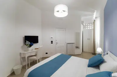 Letto o letti in una camera di Suite & Luxury Rooms Palazzo Diomede Carafa