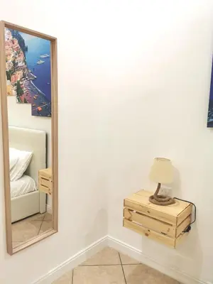 Letto o letti in una camera di I Tesori di Napoli