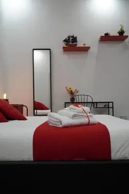 Letto o letti in una camera di I Tesori di Napoli