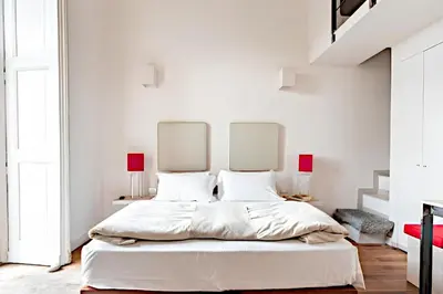 Letto o letti in una camera di Micalò Art Rooms
