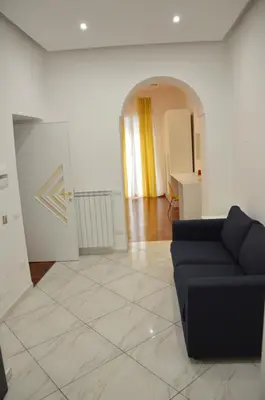 Area soggiorno di SoLuMa' Chiaja Rooms