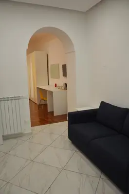 Area soggiorno di SoLuMa' Chiaja Rooms