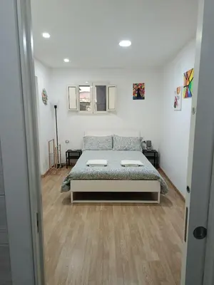 Letto o letti in una camera di Otto di denari