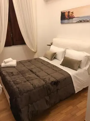 Letto o letti in una camera di Residenza san gennaro
