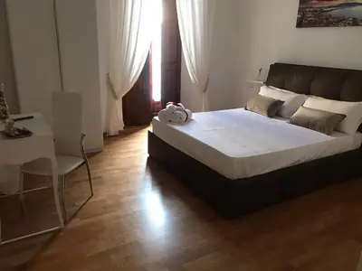 Letto o letti in una camera di Residenza san gennaro