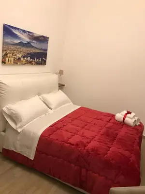 Letto o letti in una camera di Residenza san gennaro