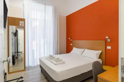 Letto o letti in una camera di Napoli Visit Home