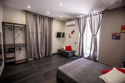 Letto o letti in una camera di Medusa Cilea Guest House