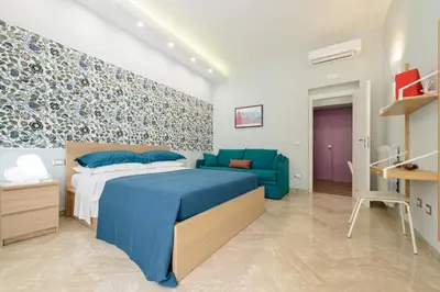 Letto o letti in una camera di Dimora San Gennaro 10